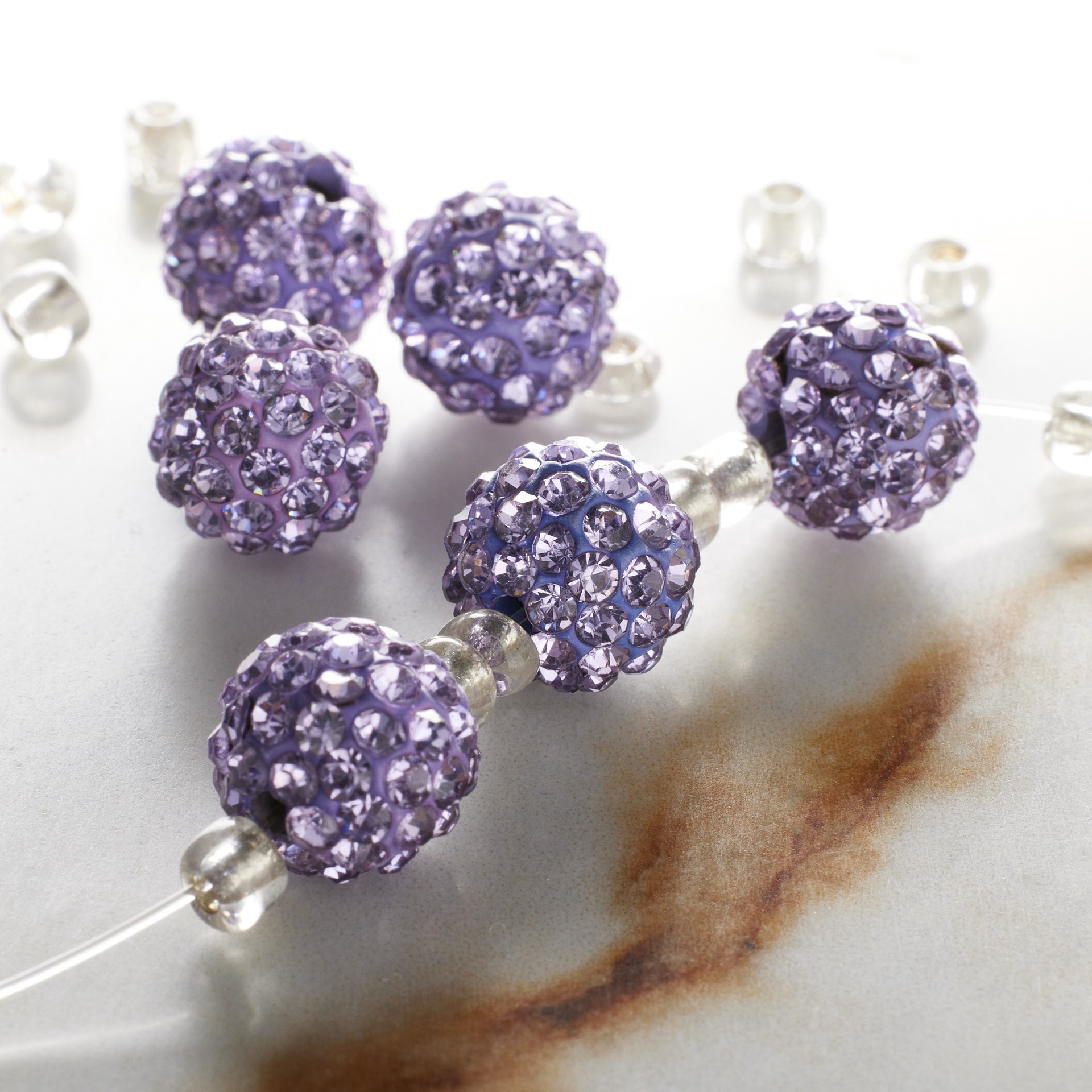 slide 2 of 3, Lavender Rhinestone Studded Round Beads, 10mm By Bead Landing, 10mm