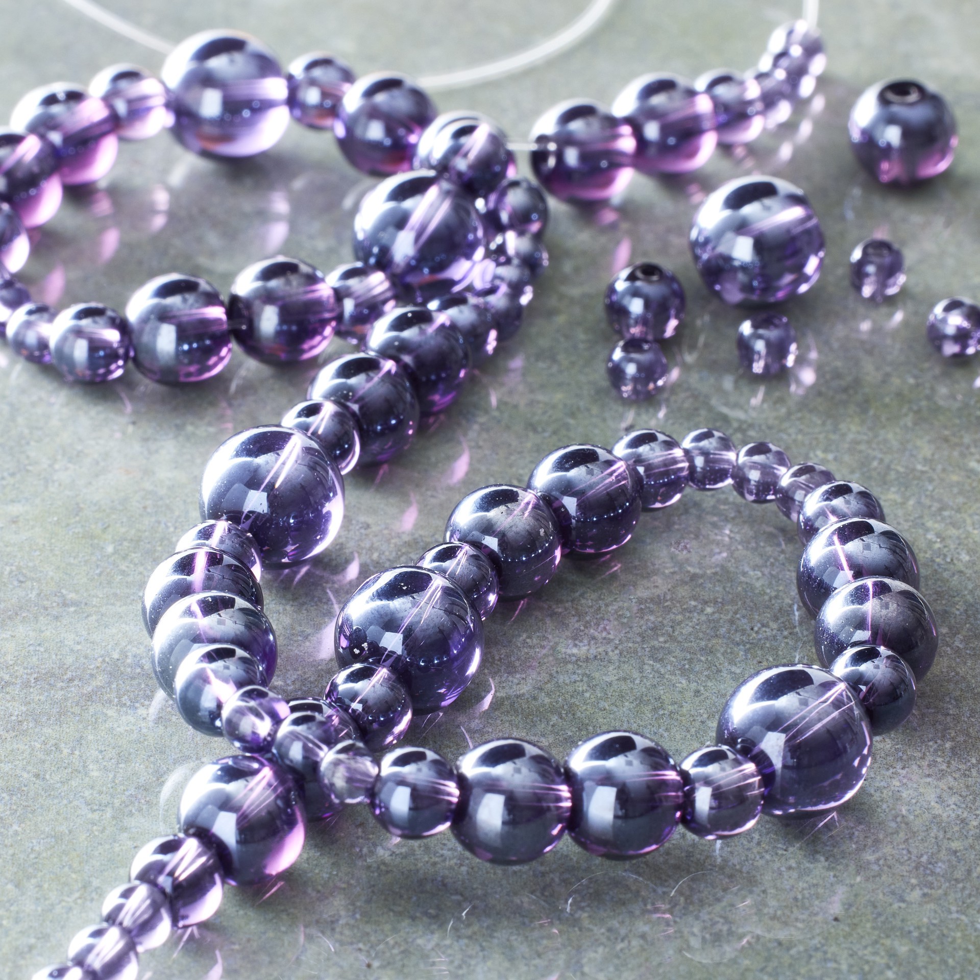 slide 2 of 3, Purple Glass Round Beads By Bead Landing, 6 mm