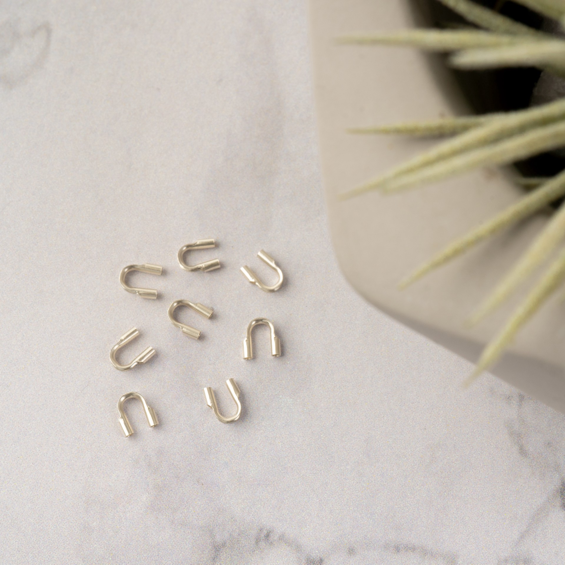 slide 3 of 3, 0.031'' Sterling Silver Wire Guards, 8ct. By Bead Landing, 8 ct