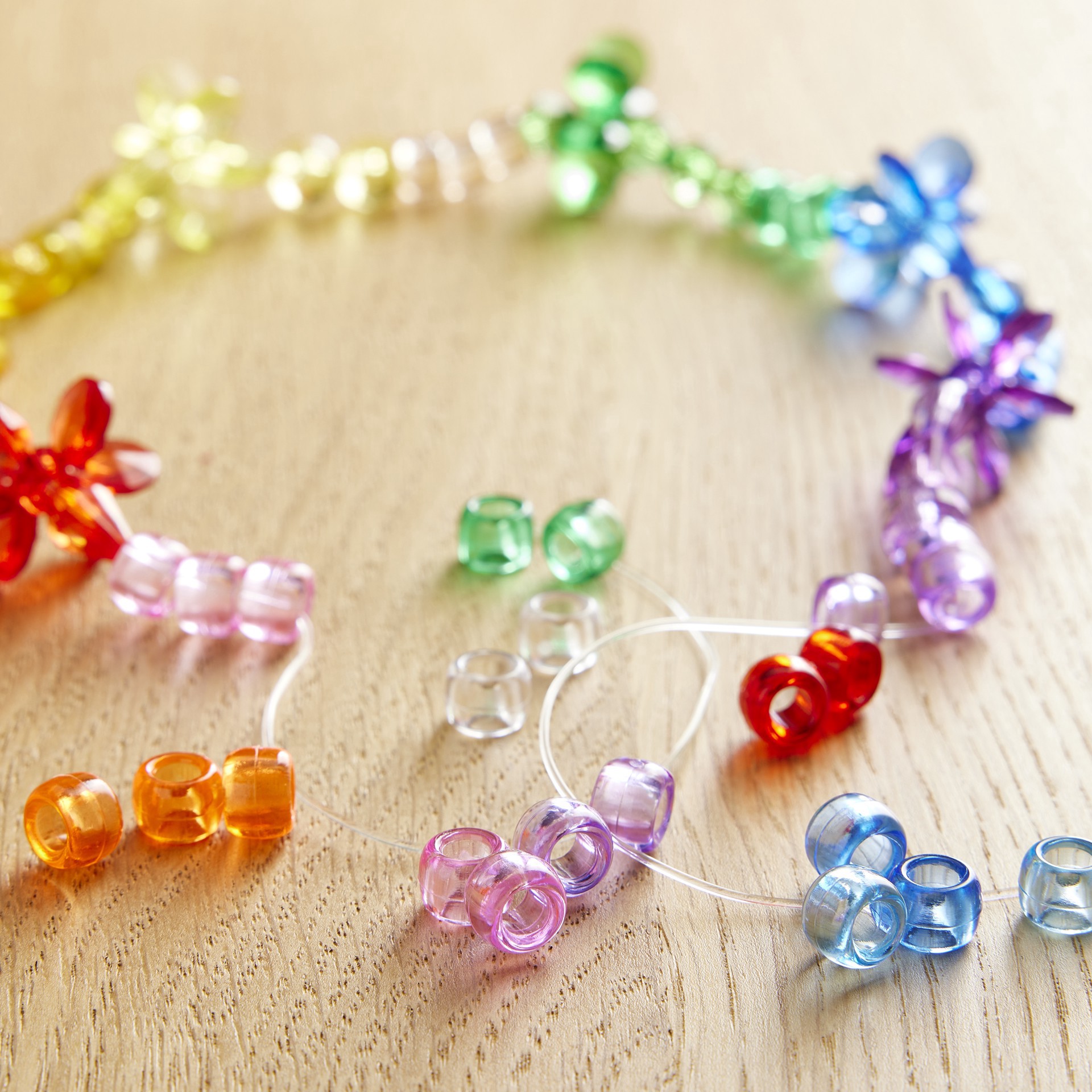 slide 2 of 4, Multicolor Transparent Pony Beads, 9mm By Creatology, 9 mm