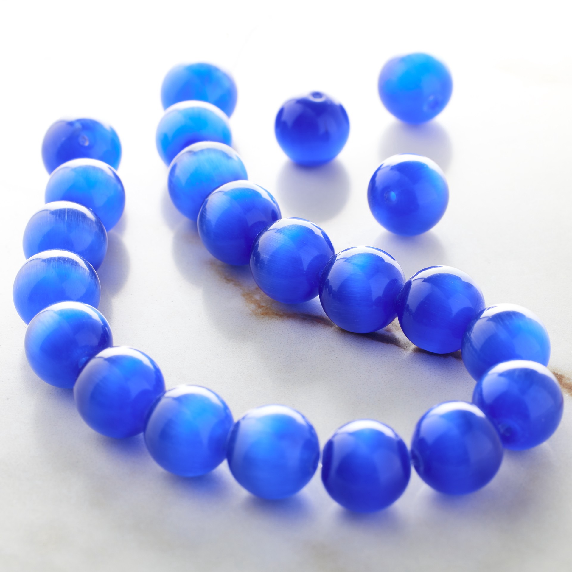 slide 2 of 3, Dark Blue Cat Eye Round Beads, 10mm By Bead Landing, 10mm