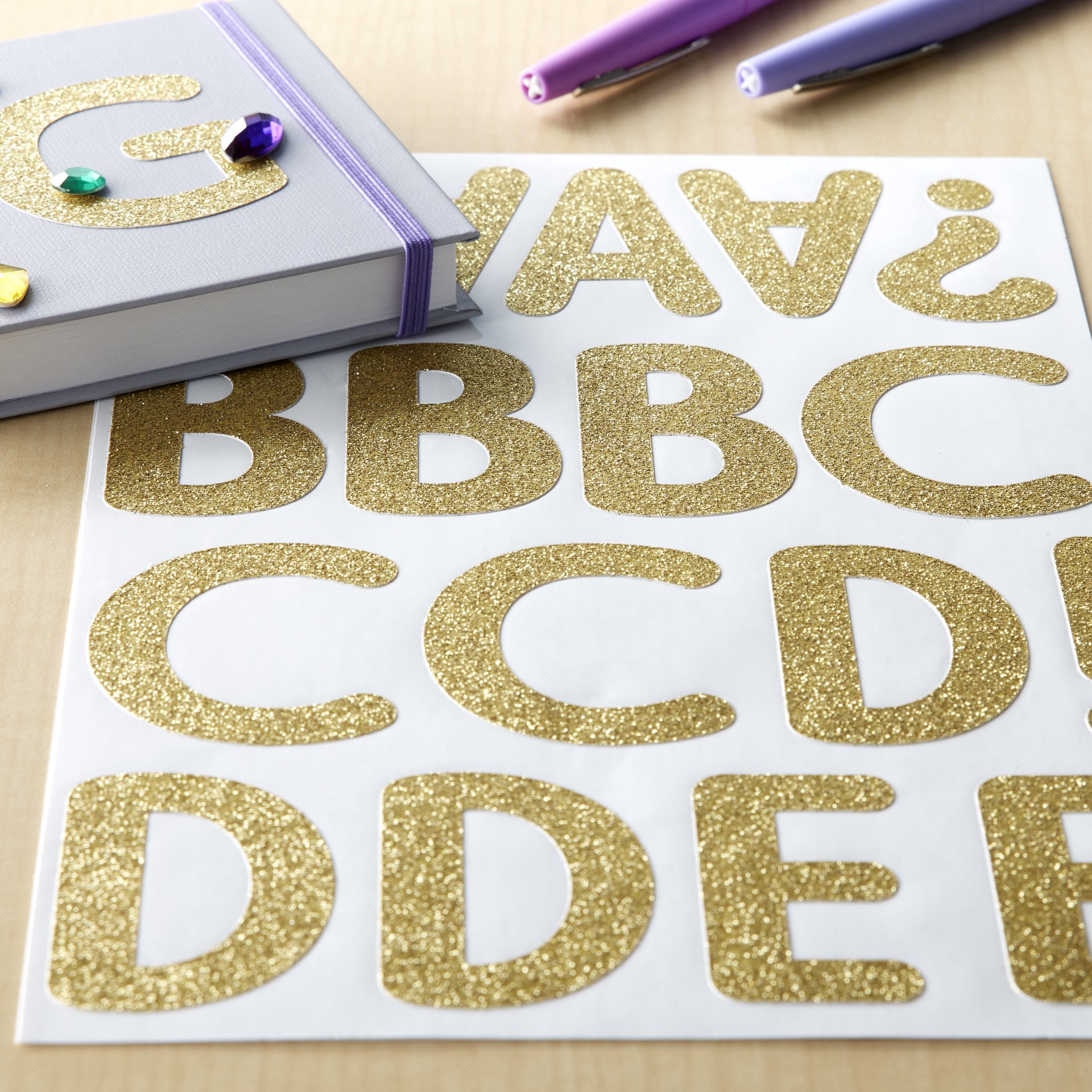 slide 3 of 5, Gold Glitter Rounded Font Alphabet Stickers By Recollections, 2.25 in