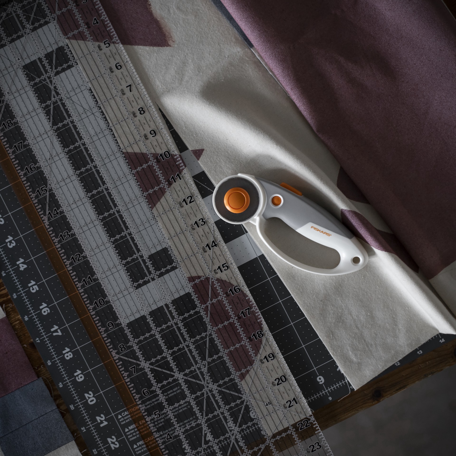 slide 6 of 9, Fiskars 45mm Multiple Layers Loop Rotary Cutter, 45 mm