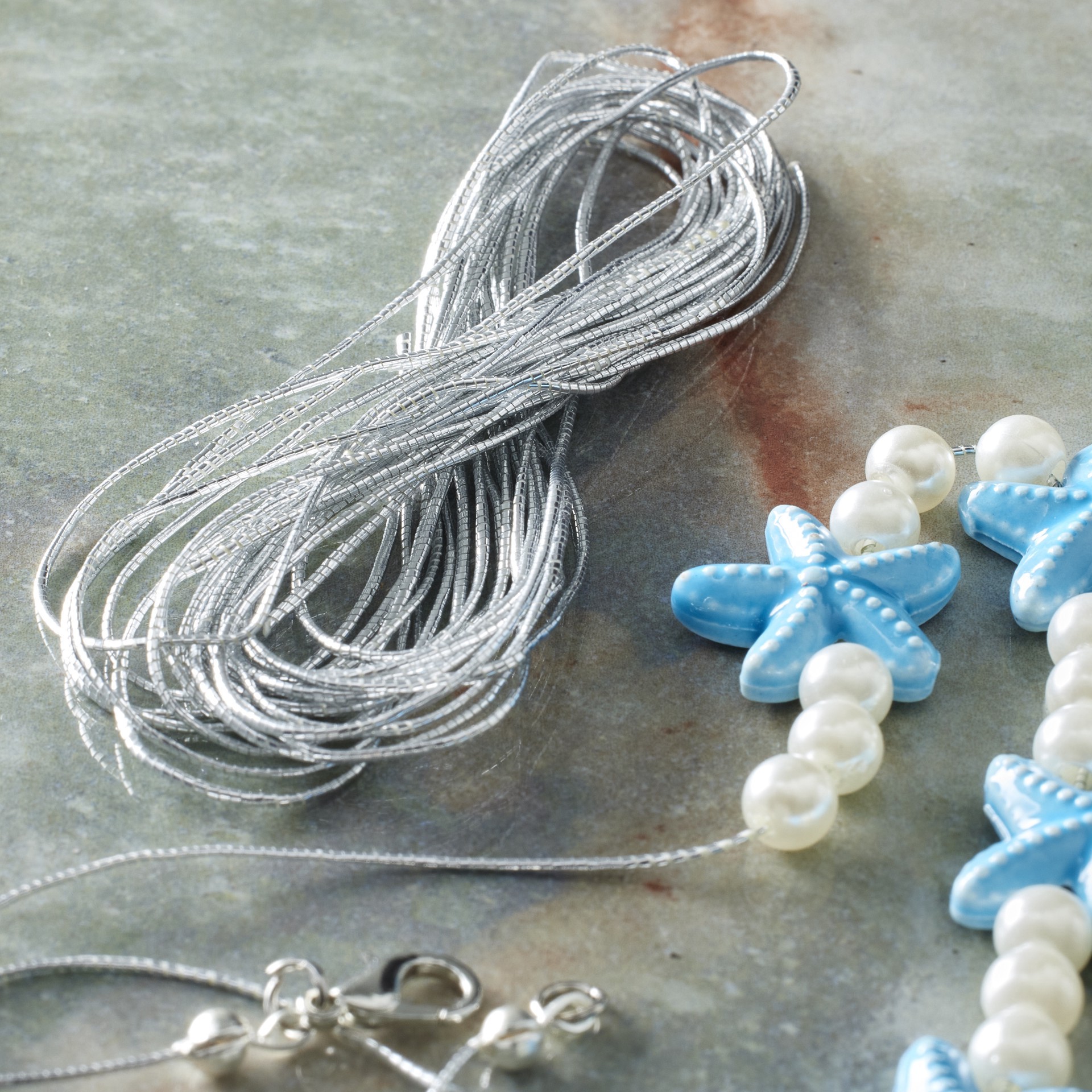 slide 2 of 2, 1mm Silver Elastic Cord By Bead Landing, 1mm