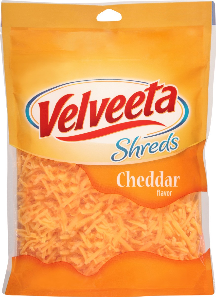 slide 4 of 7, Velveeta Shreds Cheddar Flavored Shredded Cheese, 8 oz Bag, 8 oz