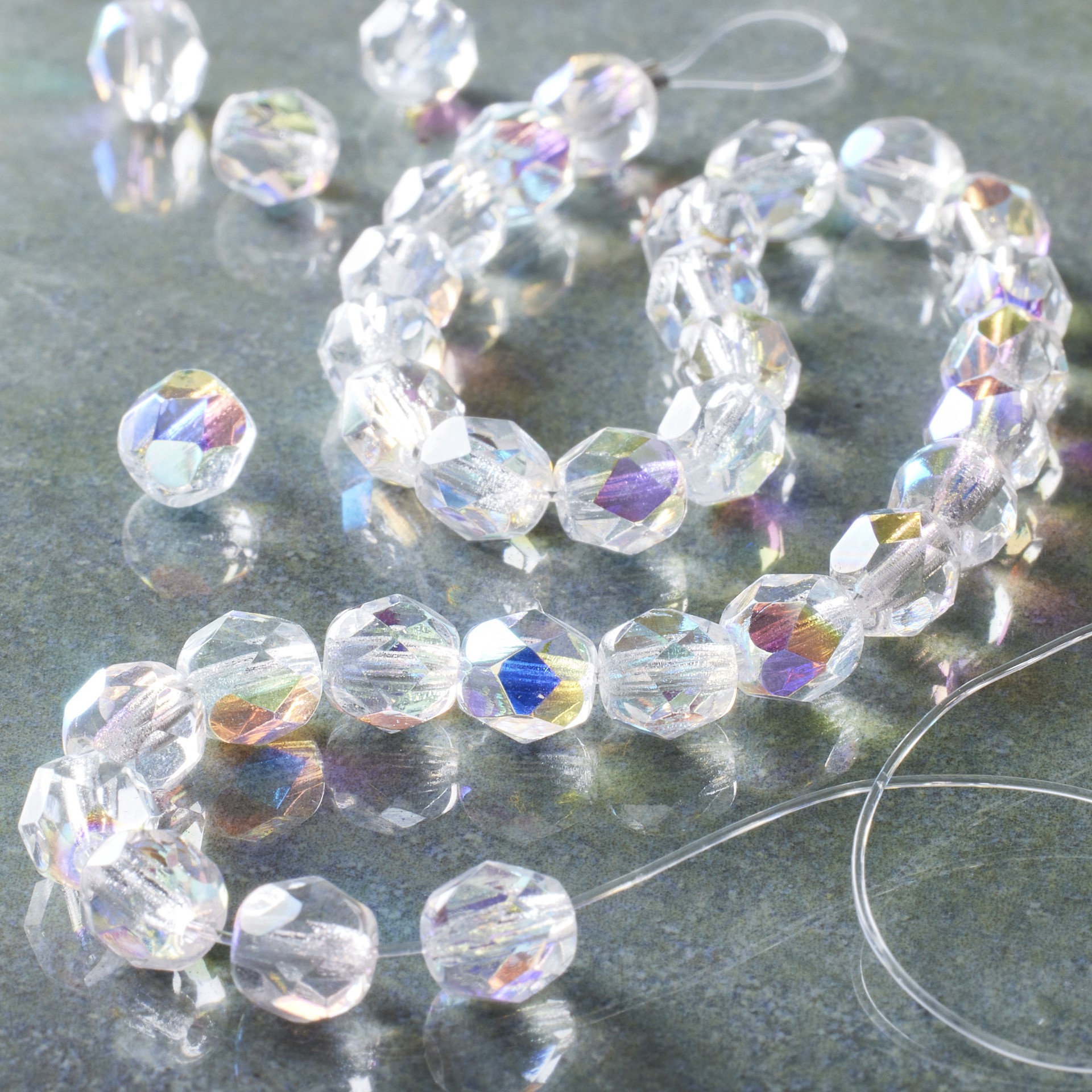 slide 2 of 3, Crystal Aurora Borealis Czech Glass Faceted Round Beads, 6mm By Bead Landing, 6 mm