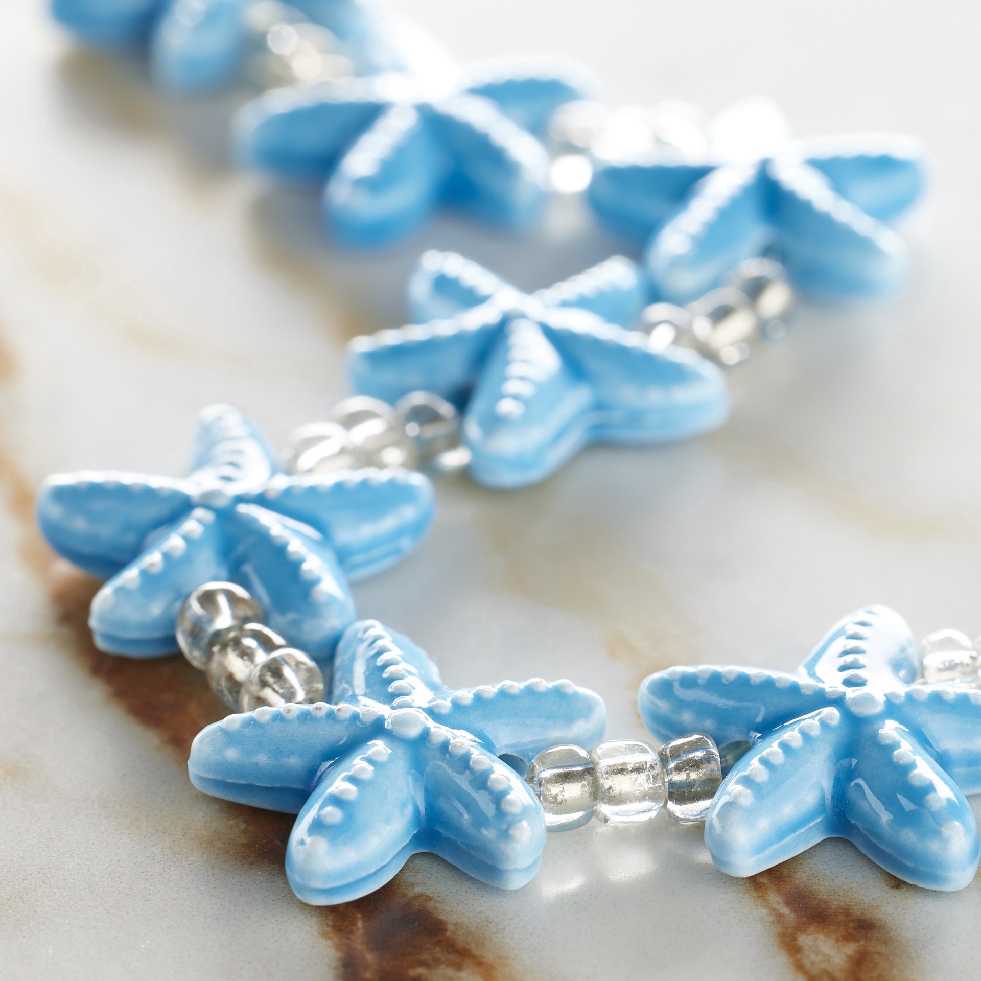 slide 2 of 3, Turquoise Starfish Ceramic Beads, 18mm By Bead Landing, 18mm