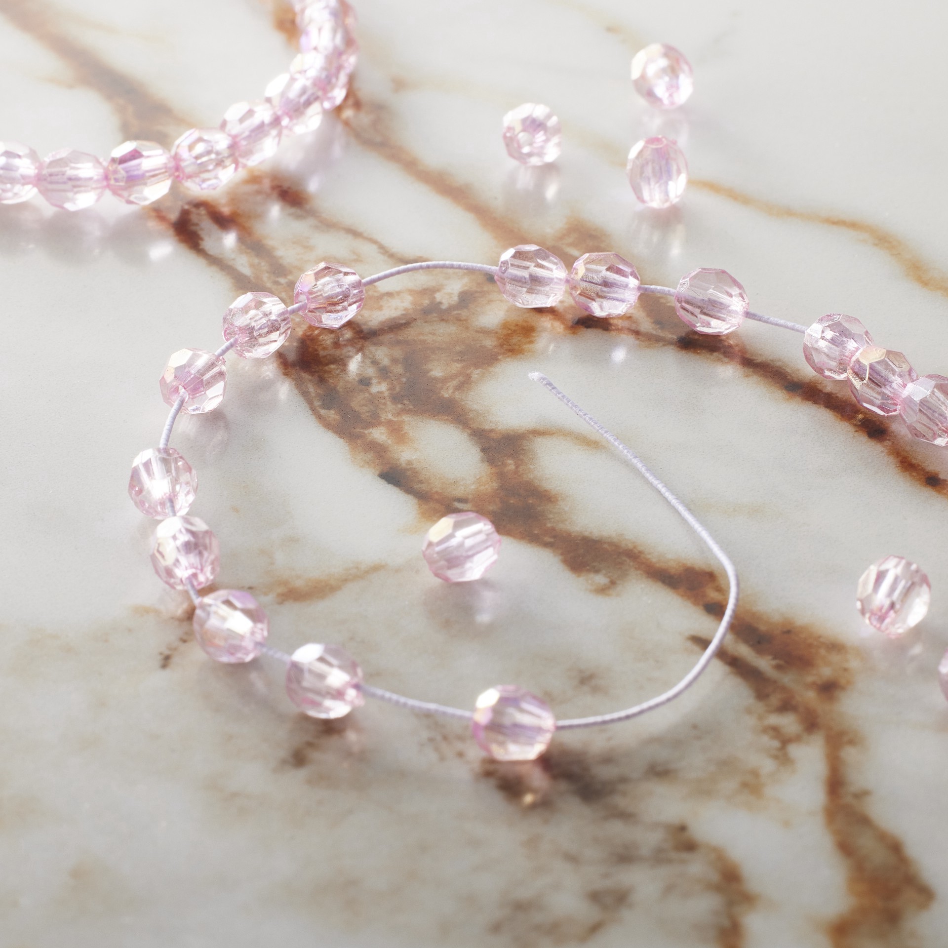 slide 2 of 3, 0.5mm White Elastic Cord, 75yd. By Bead Landing, 0.5mm