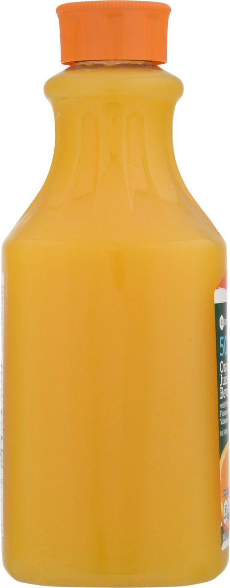 slide 4 of 13, SE Grocers Oj 50% Less Sugar, 52 oz