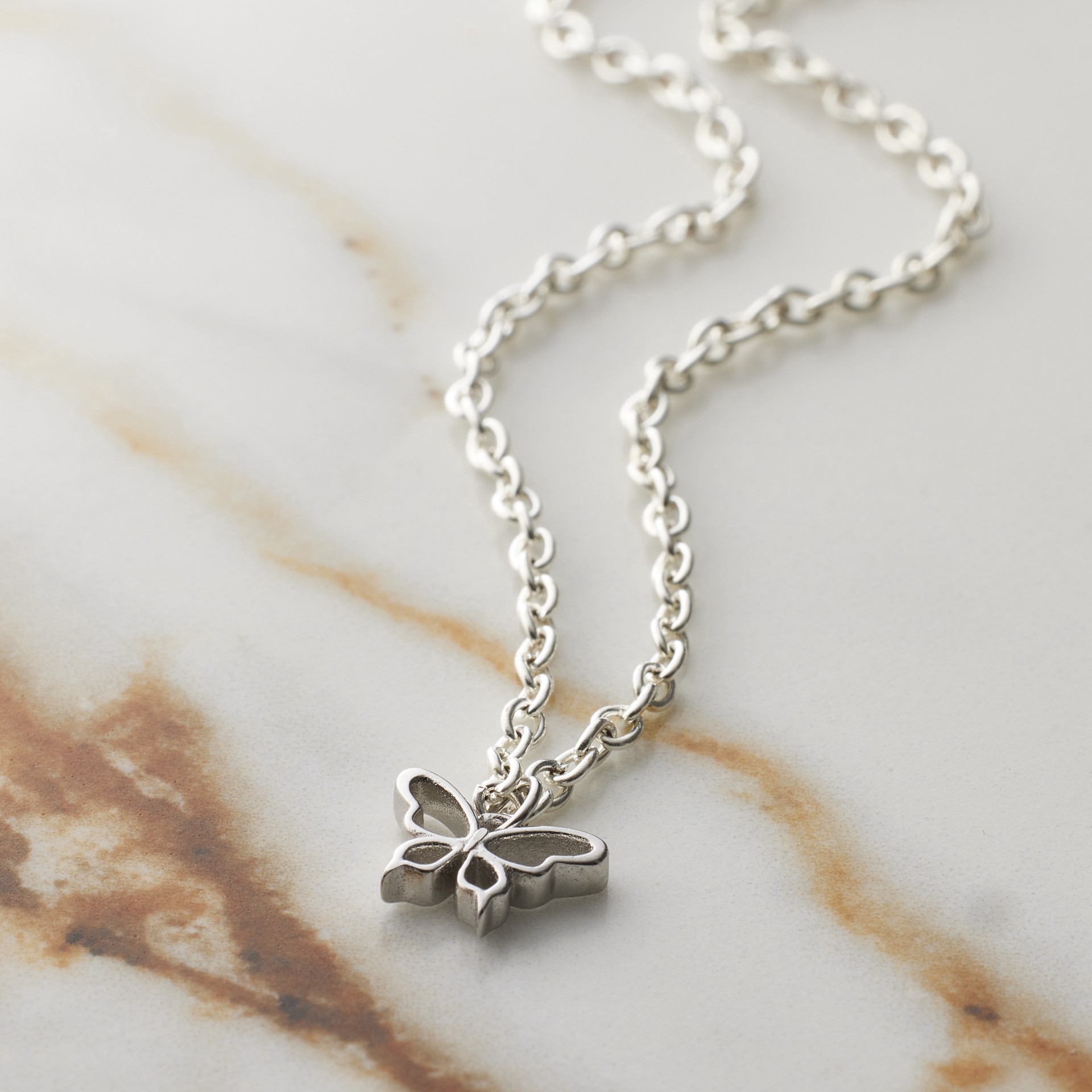 slide 4 of 6, Sterling Silver Butterfly Icon Charm By Bead Landing, 0.35 in x 0.39 in x 0.09 in