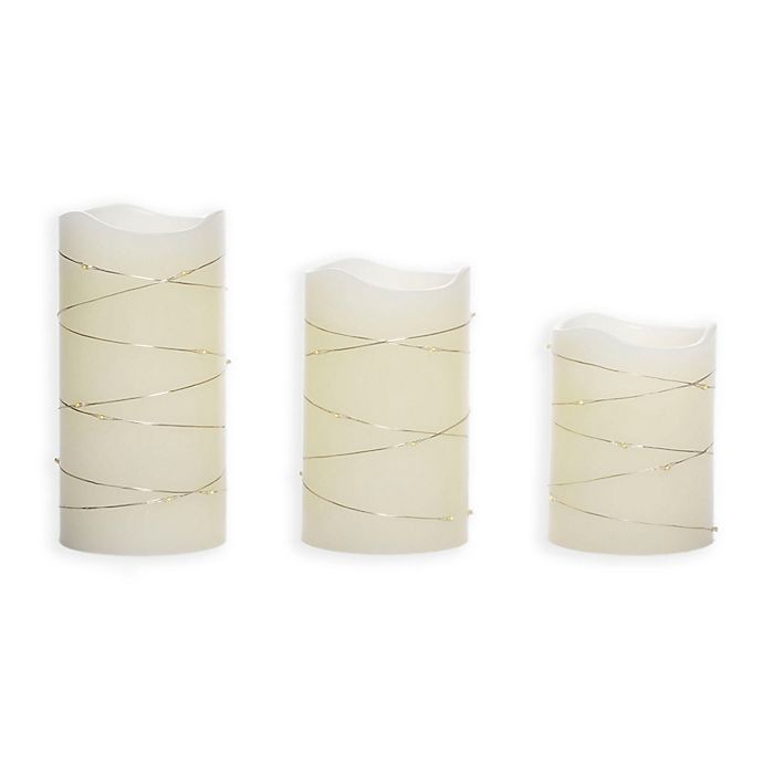 slide 1 of 2, Candle Impressions Pillar Candle with String Lights - Cream, 3 ct