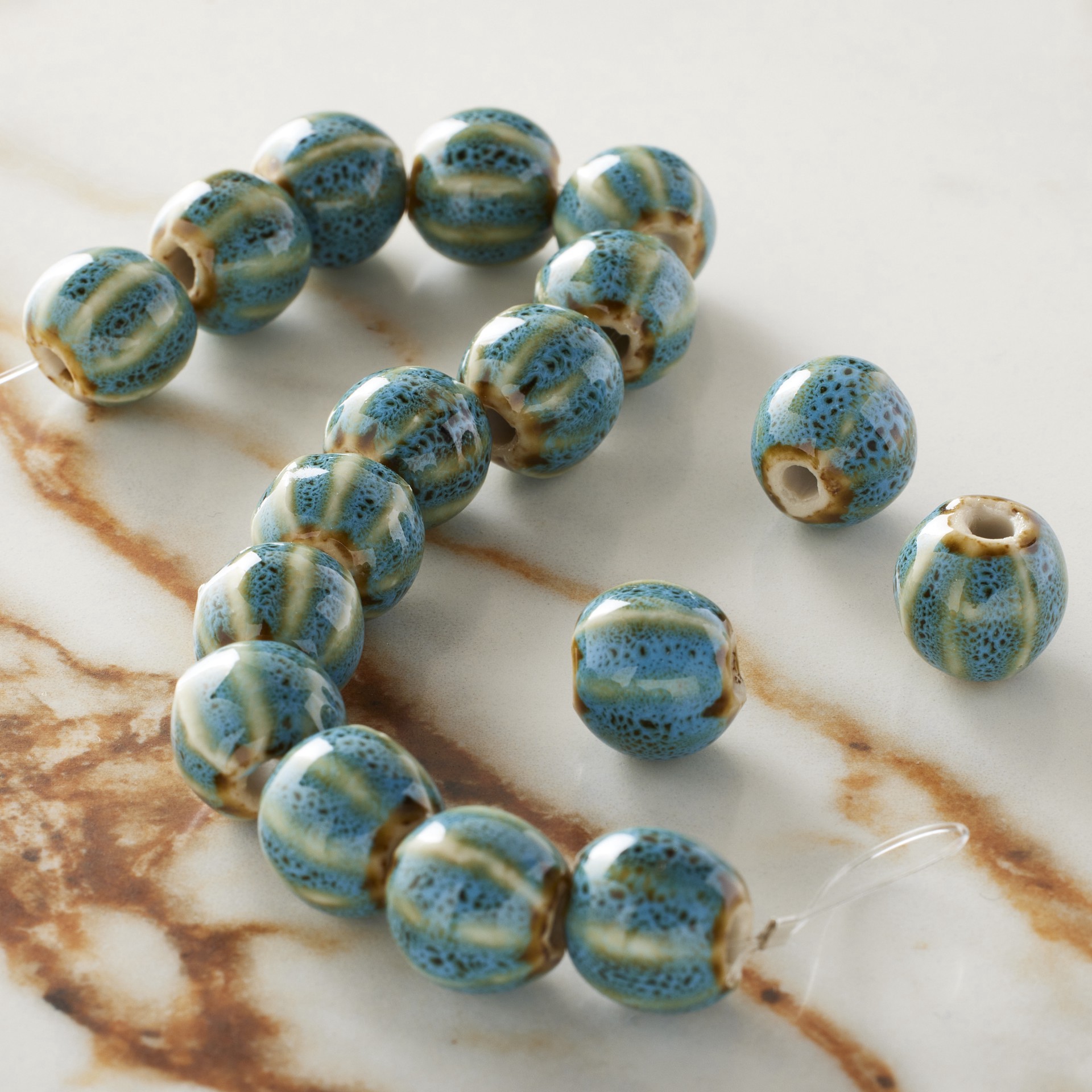 slide 3 of 3, Turquoise Ceramic Round Melon Beads, 10mm By Bead Landing, 10mm