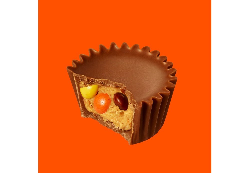 slide 2 of 4, Reese's Pieces Stuffed with Pieces Miniatures Milk Chocolate Peanut Butter Cups Hearts 10 oz, 10 oz