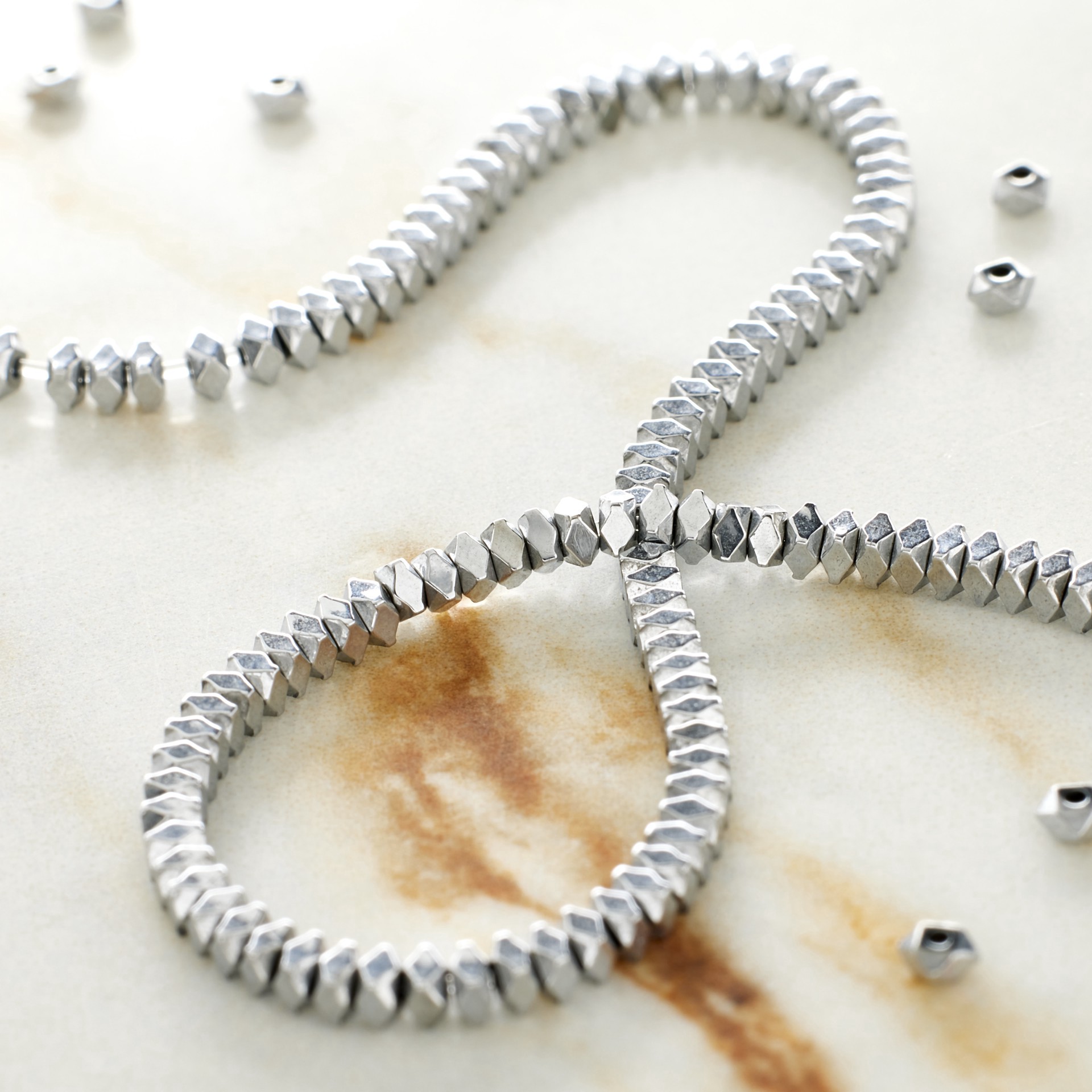 slide 2 of 3, Rhodium Hematite Faceted Beads By Bead Landing, 2mm, 2mm