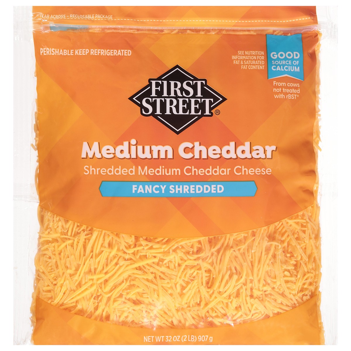 slide 1 of 13, First Street Medium Cheddar Fancy Shred, 2 lb