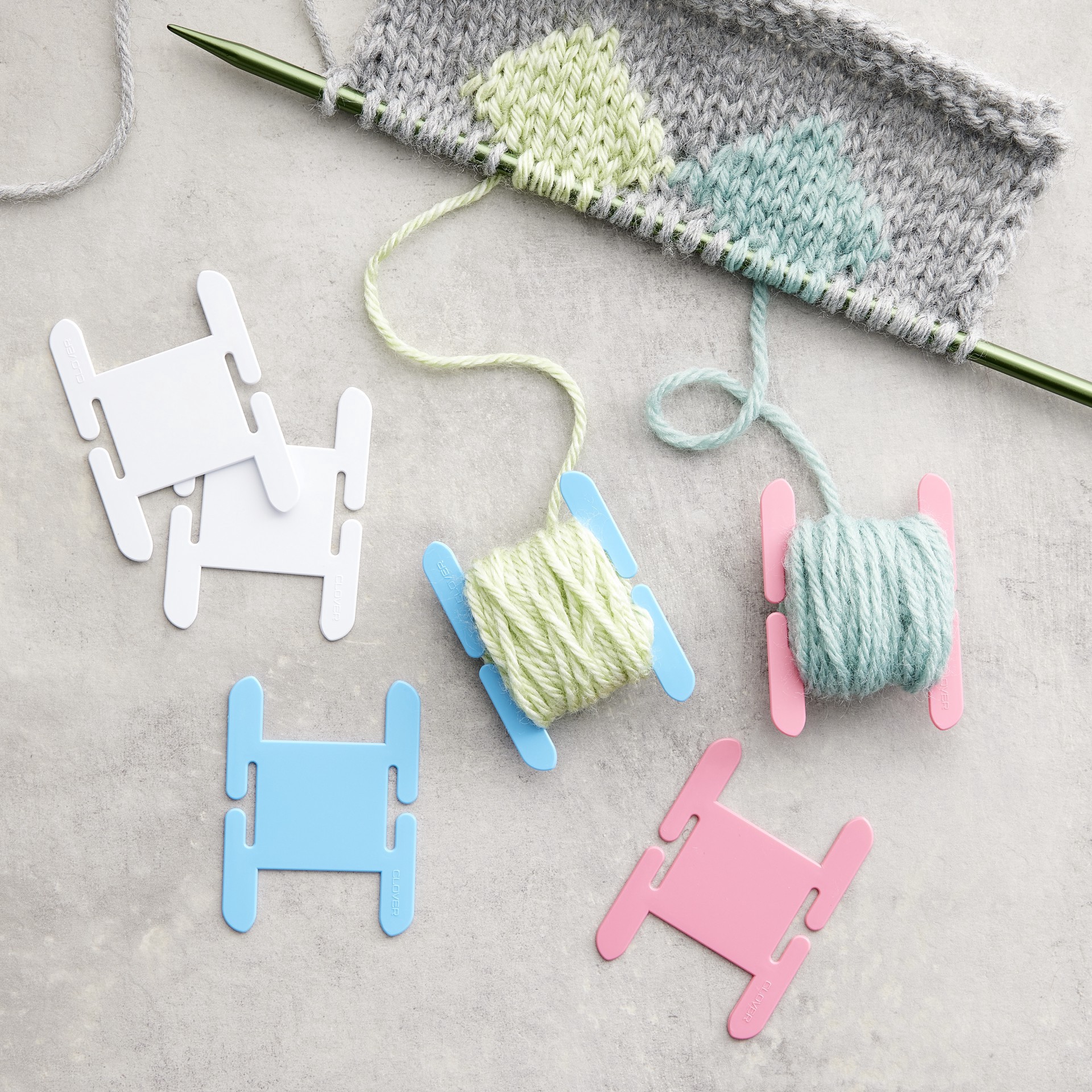 slide 2 of 4, Clover Knitting Bobbin Set, 1.5 in x 2.5 in