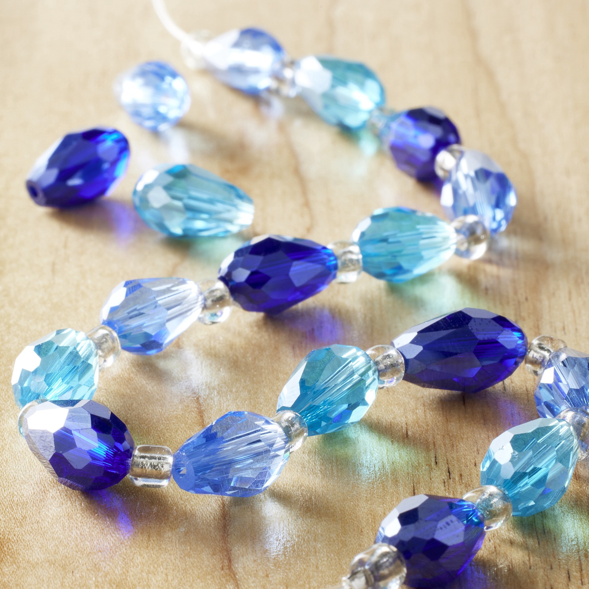 slide 2 of 3, Aqua Teardrop Faceted Glass Beads, 11mm By Bead Landing, 11mm