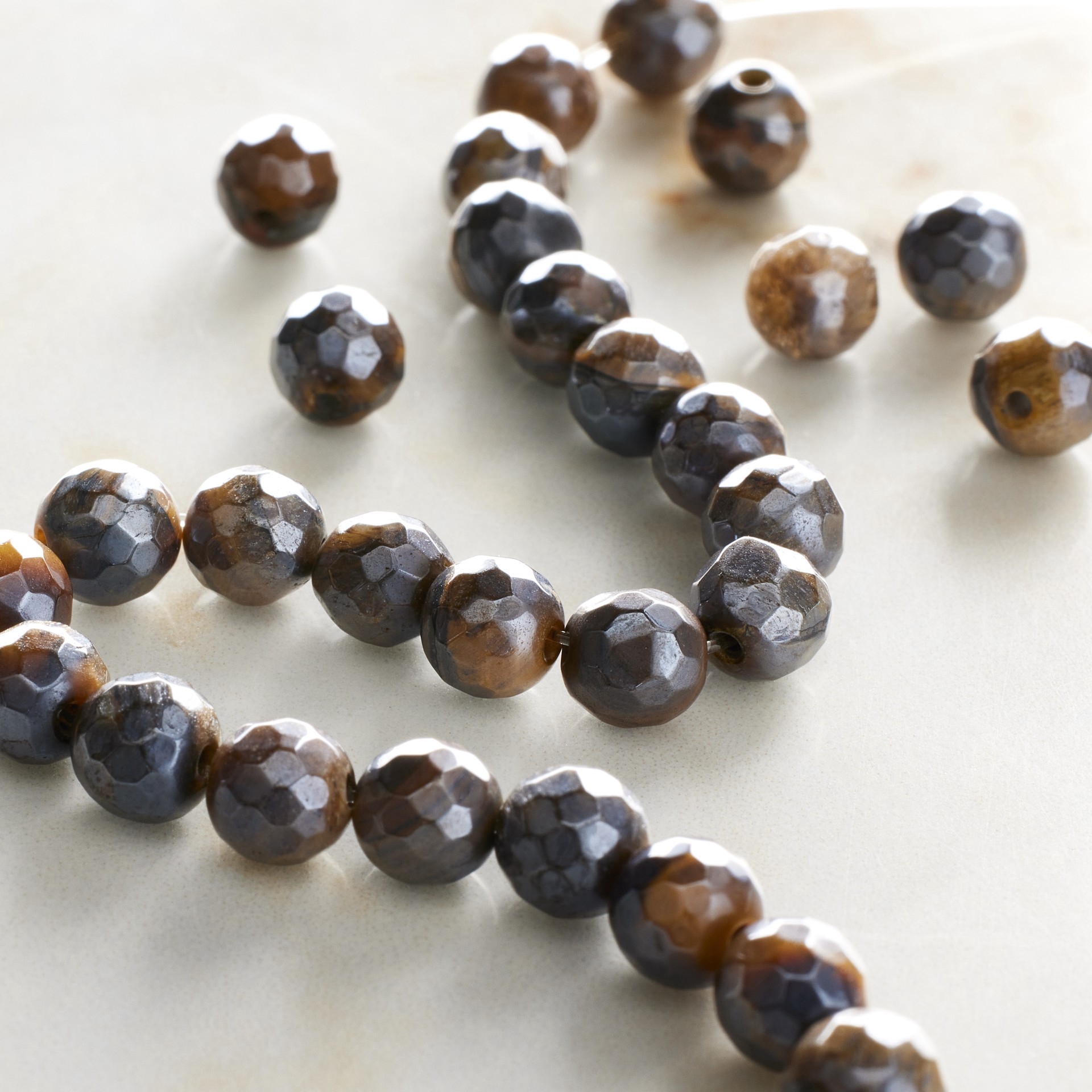 slide 2 of 3, Yellow Tiger Eye Silverite Faceted Round Beads By Bead Landing, 6mm, 6 mm