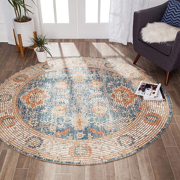 slide 3 of 8, Anji Mountain Floral 4' Round Handcrafted Jute Area Rug - Blue/Orange/Beige, 1 ct