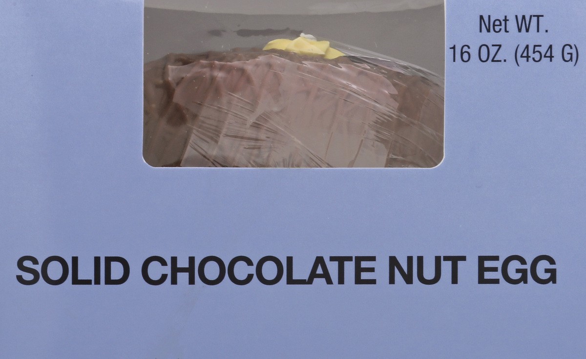 slide 1 of 9, Anderson's Candies Solid Chocolate Nut Egg 16 oz, 16 oz