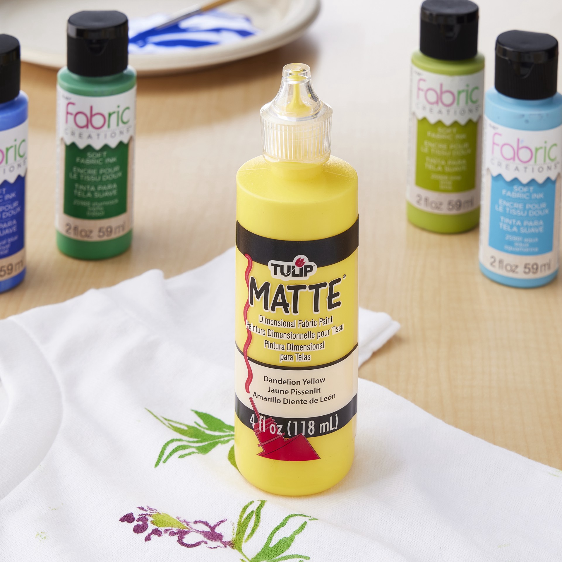 slide 2 of 2, Tulip Matte Dandelion Yellow Dimensional Fabric Paint, 4 fl oz