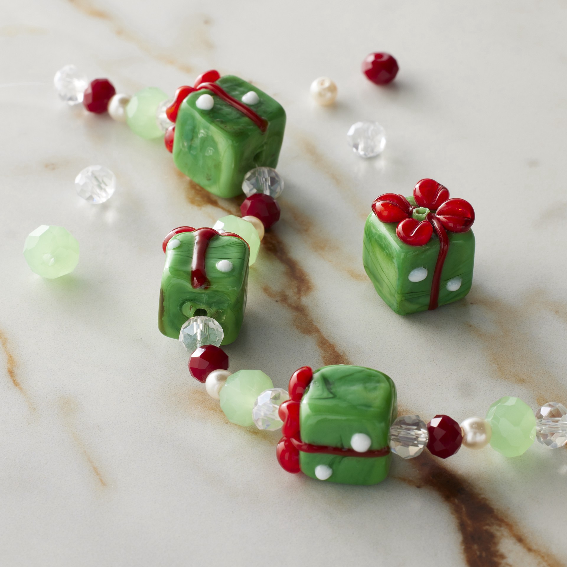 slide 3 of 3, Green Gift Box Lampwork Glass Bead Mix By Bead Landing, 14mm x 13mm