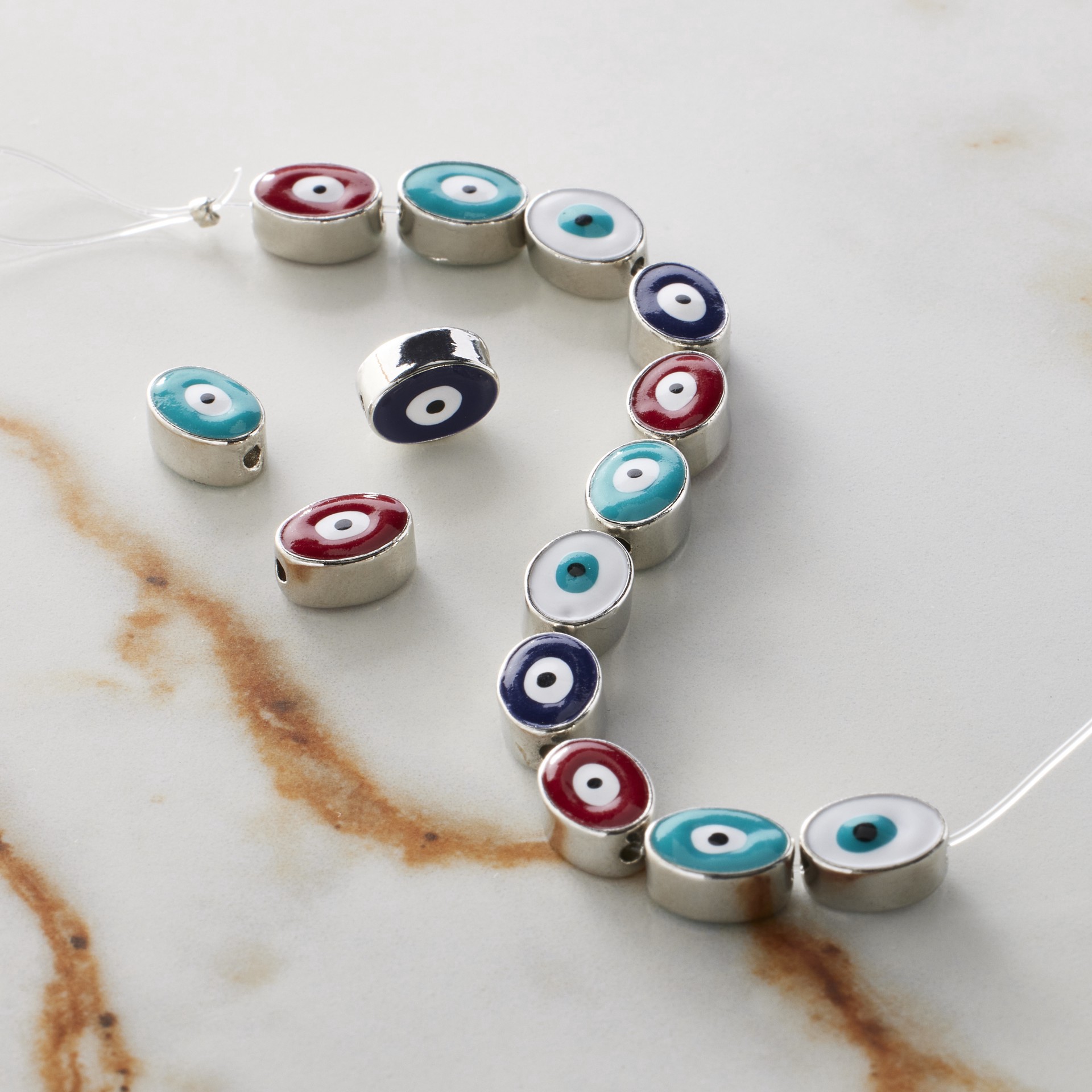 slide 3 of 3, Multicolor & Rhodium Evil Eye Oval Beads, 9mm By Bead Landing, 9 mm