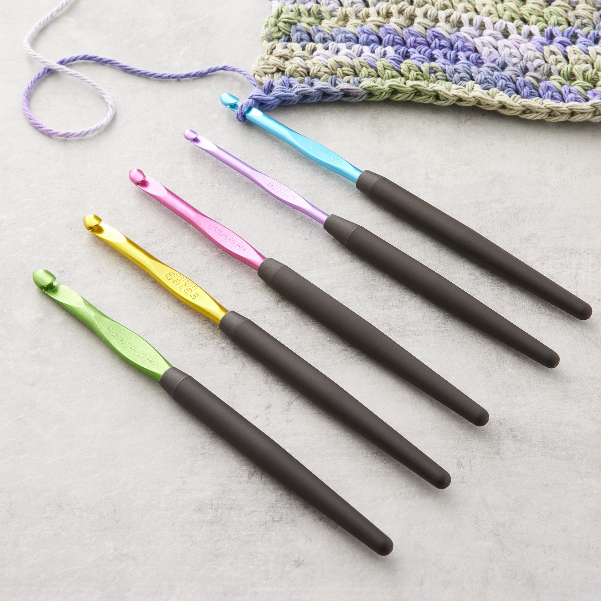 slide 3 of 3, Coats Susan Bates Soft Ergonomic Crochet Hook Set, G-K, 5 hooks