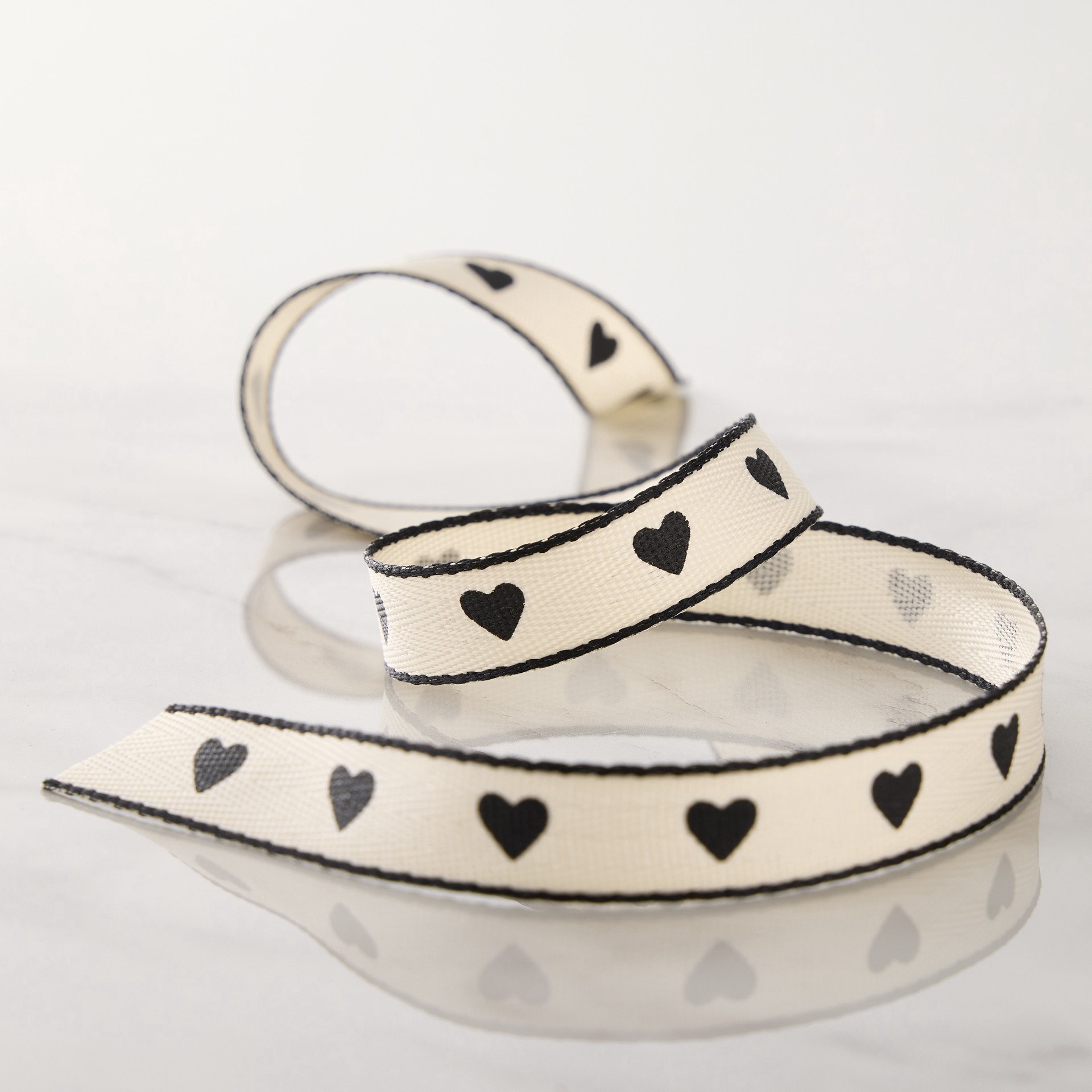 slide 2 of 2, 5/8" X 7yd. Black Hearts Faux Linen Ribbon By Celebrate It Classic, 5/8 in x 7 yd