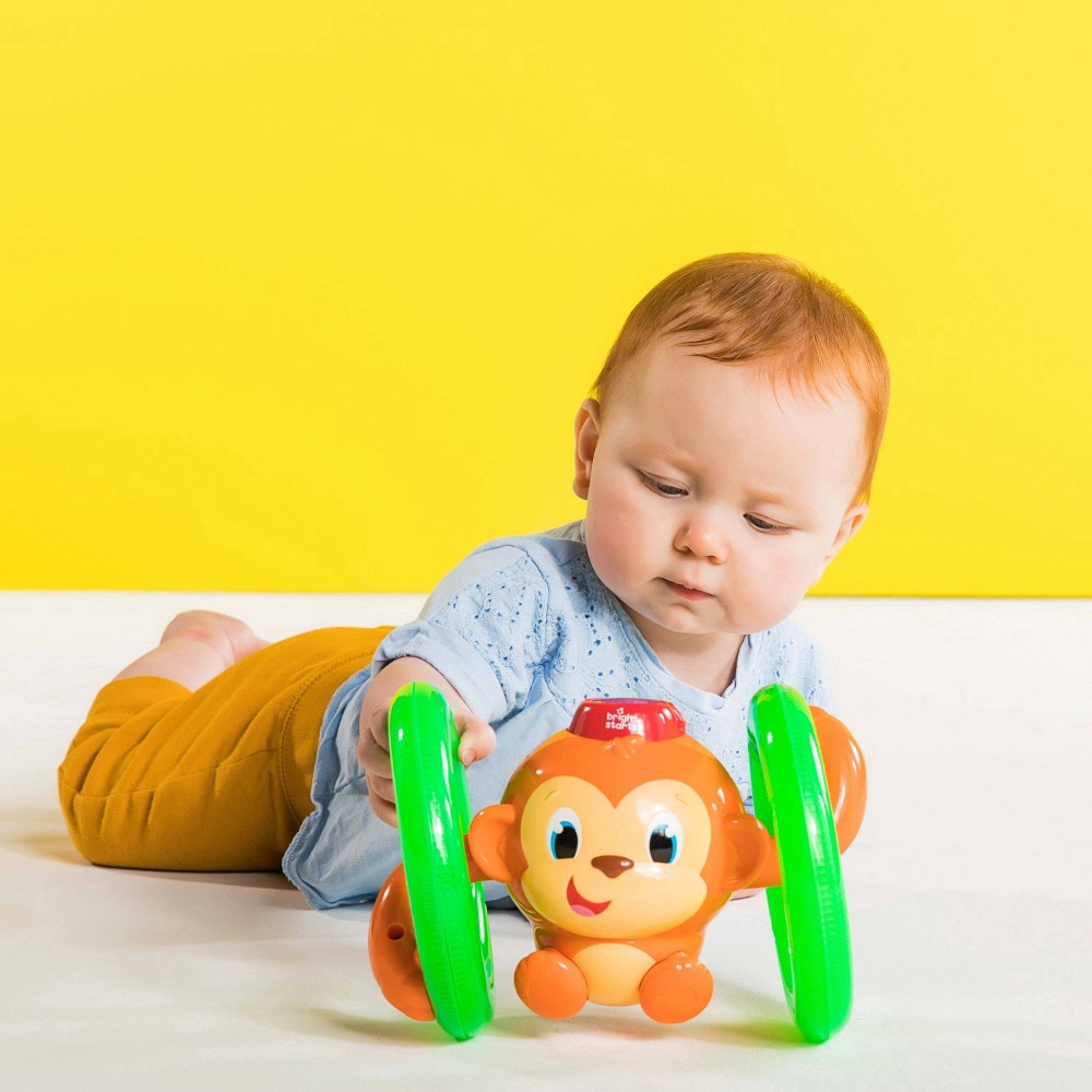 slide 4 of 14, Bright Starts Roll & Glow Monkey Toy, 1 ct