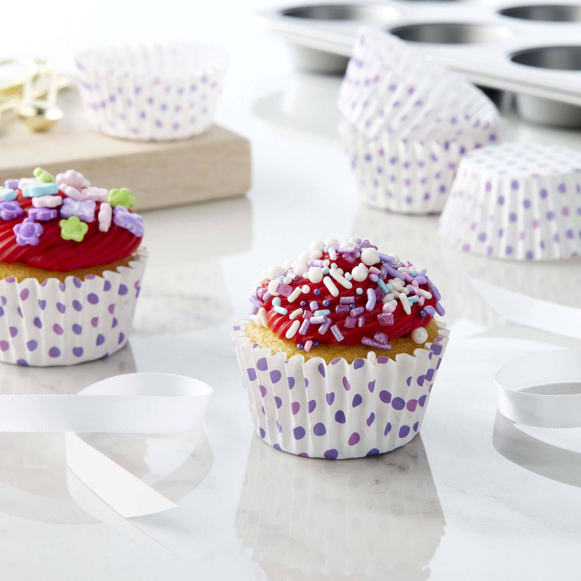 slide 2 of 3, Multi Purple Polka Dot Grease Resistant Baking Cups By Celebrate It, 1.97 in x 1.18 in